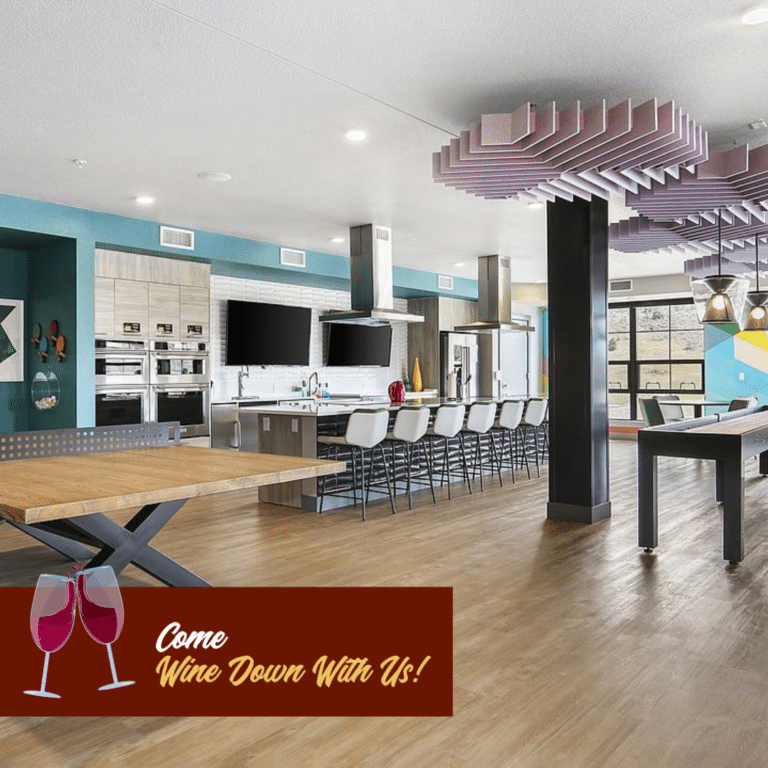 Aurum Apartments lounge area with Wine Down branding